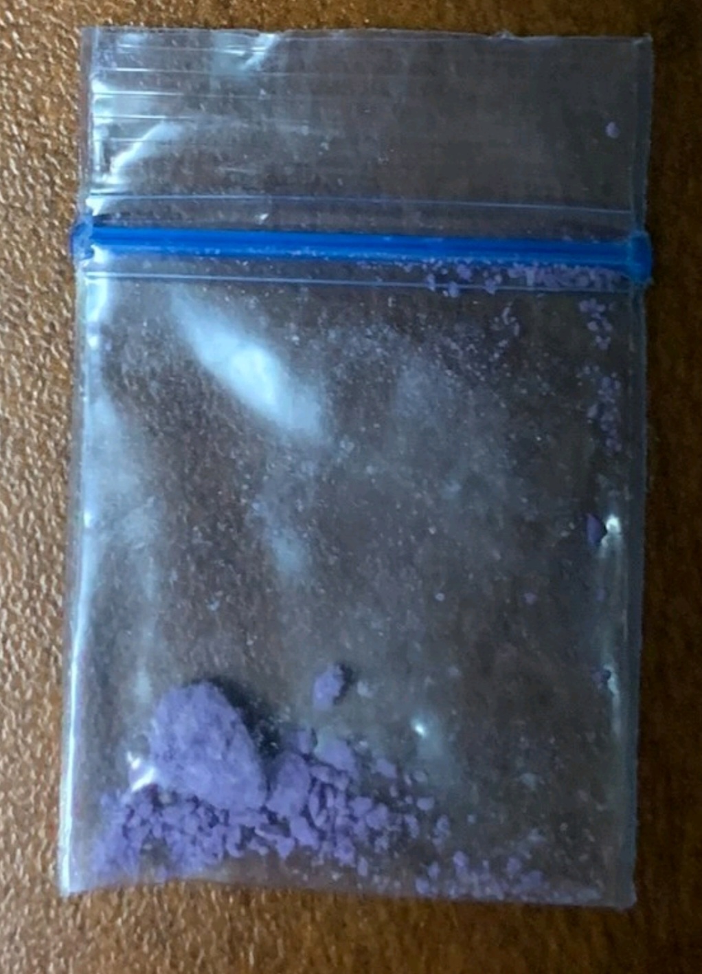 Purple chunky down with chalky texture contains fentanyl, benzos and possibly carfentanil